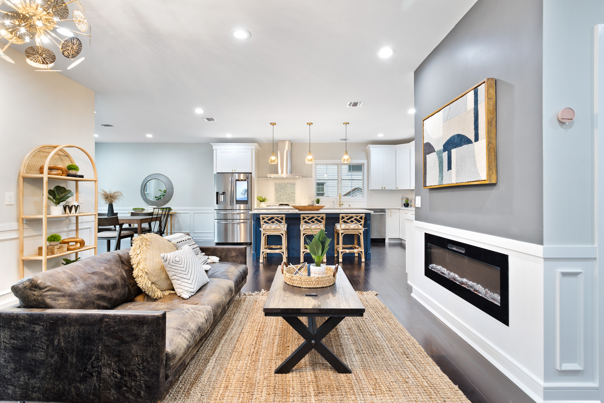 Open concept living room with fireplace , NJ RE Photo