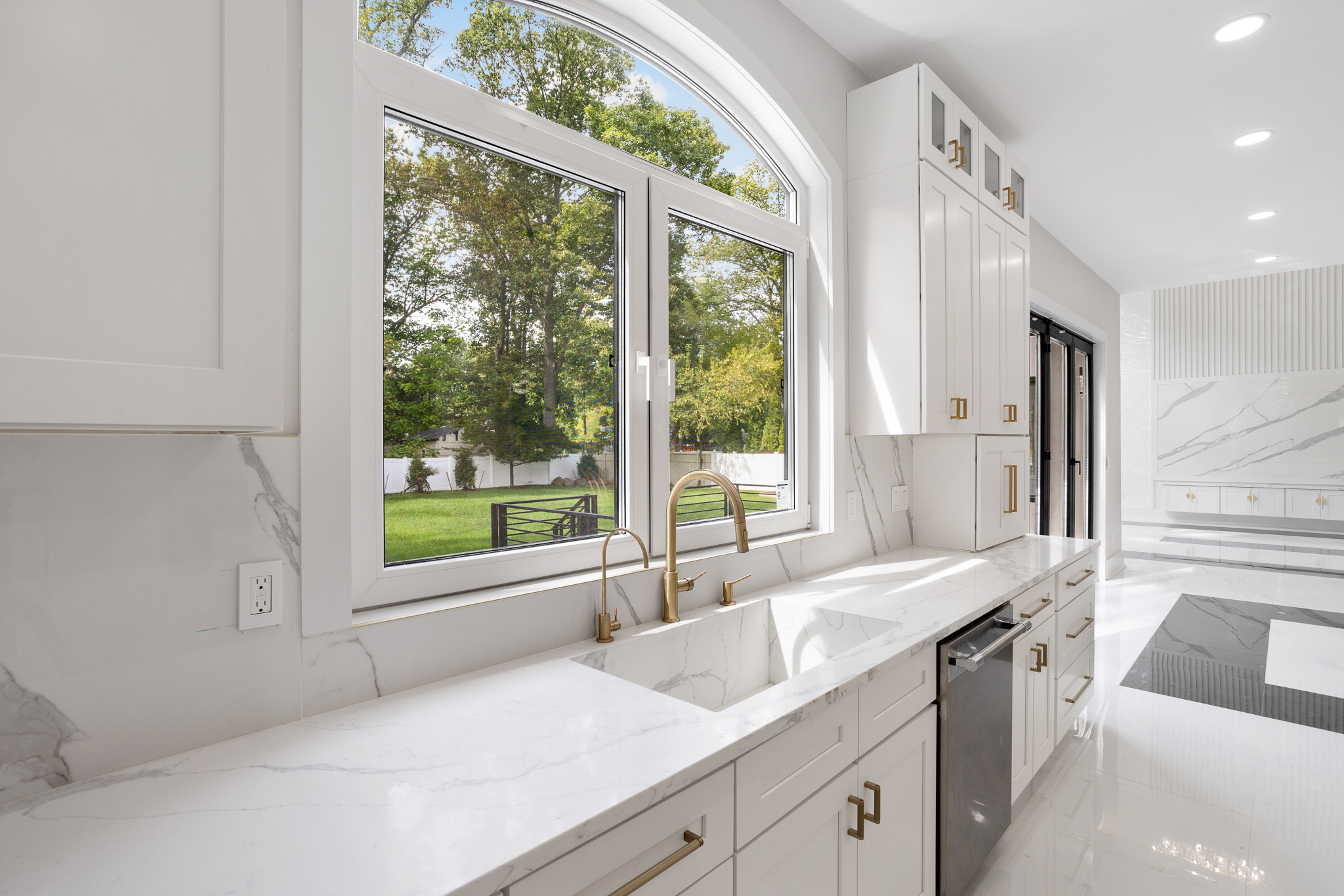 Gold fixtures kitchen with arched window , NJ RE Photo